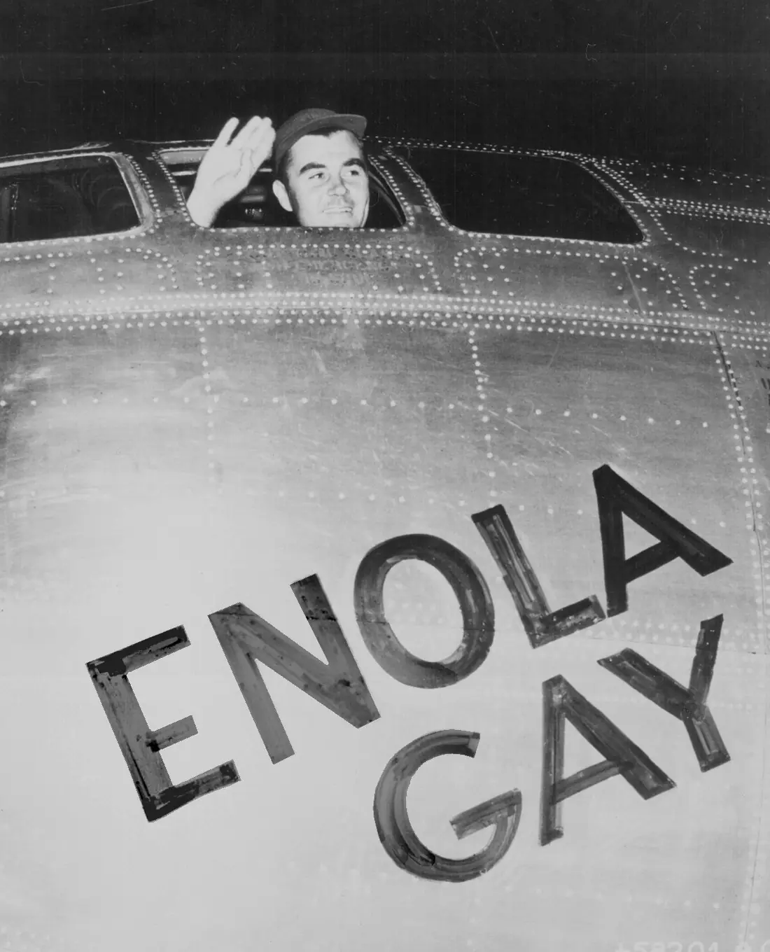 Enola Gay departs for Hiroshima, ushering in the nuclear age — Tinian Island, Pacific Ocean